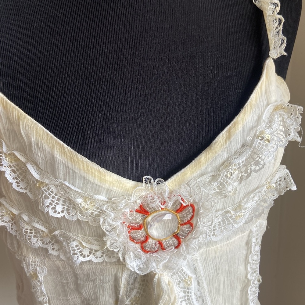 French Jaune Rouge strappy, light fabric top.Creamy pale vanilla ( not white)